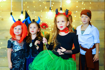 Happy group of children during Halloween party