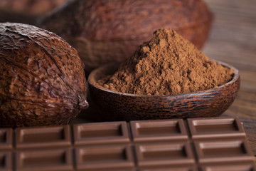 Chocolate bar, candy sweet, dessert food on wooden background