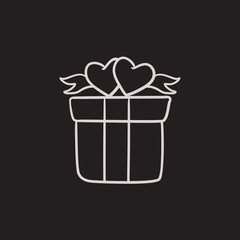 Gift box with hearts sketch icon.