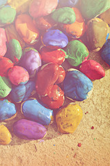 stones with a smooth surface painted colorful paint