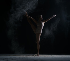 Modern art. Photo of flexible female dancer posing