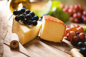Cheese, grape and wine cork