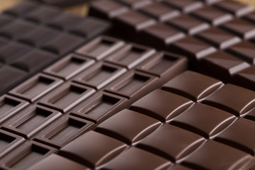 Bars Chocolate , candy sweet, dessert food on wooden background
