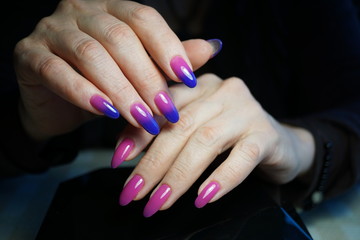 Fototapeta premium Awesome nails and beautiful clean manicure. Nails are natural. Manicure is made using nails drill machine.