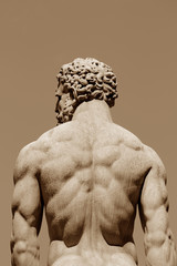 Picture of a statue of a muscular man