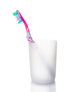 One toothbrushe in a glass