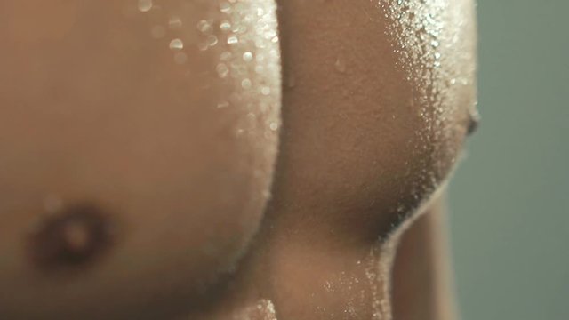 Close up of sportsman sweaty body. Slowly