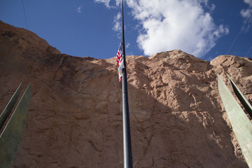 Winged Figures of the Republic memorial monument - American flag