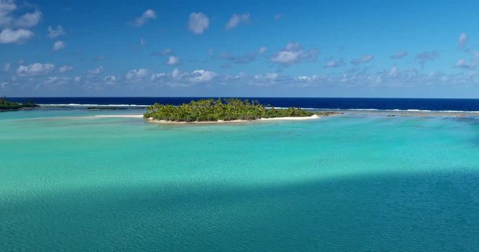 Aerial view of beautiful tropical island lagoon white sand beach in South Pacific