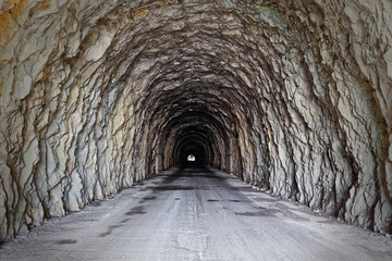 Tunnel excavated in the Apuan mountains, crossover concept