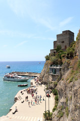Port in Cinque Terre village Monterosso al Mare, Torre aurora and Mediterranean Sea, Italy