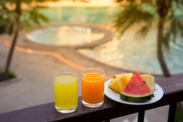 Orange juice around a swimming pool