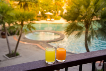 Orange juice around a swimming pool