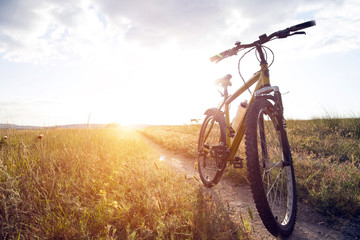 Fototapeta na wymiar Silhouette Mountain biking at sunset