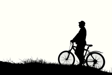 Fototapeta na wymiar Silhouette of sports person cycling on the field on the beautiful sunset