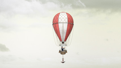 Aerostats flying high . Mixed media