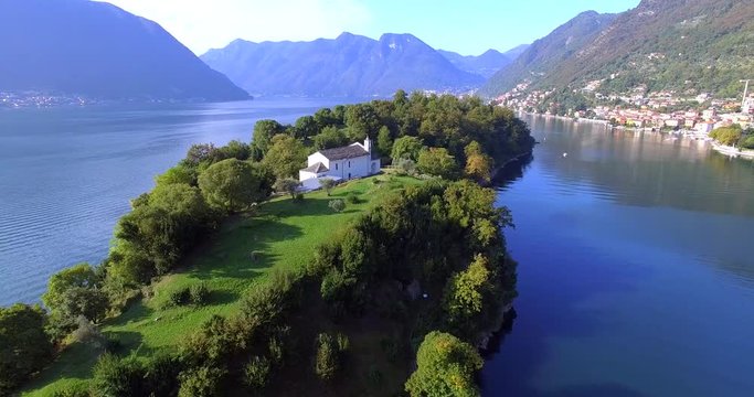 Aerial 4k - Isola Comacina - Ossuccio - Lago di Como (IT) - Vista aerea della Chiesetta di S. Giovanni 