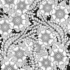 Seamless ornamental black and white pattern with stylized abstract flowers.