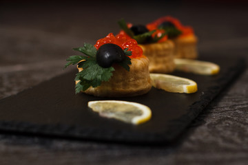 Snacks with red caviar
