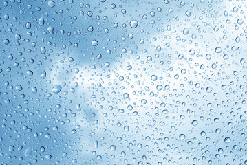 Naklejka na ściany i meble Drops of water on glass