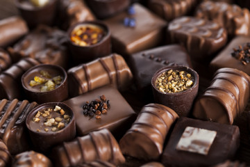 Praline Chocolate on wooden backgroud