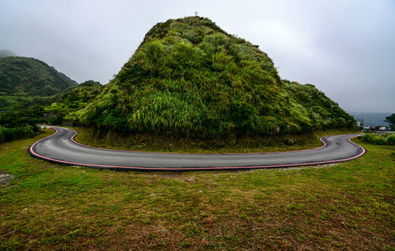 Potentially Dangerous Hairpin Curve On A Mountain Road Along The Coast Of Jiufen, Taiwan