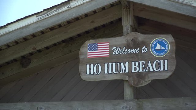 Ho Hum beach sign on a building at Fire Island