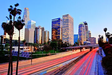 Schilderijen op glas City of Los Angeles Downtown at Sunset With Light Trails © romanslavik.com