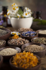 Natural medicine on wooden table background