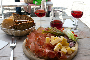 Speck, cheese and bread typical delights served at the alpine huts - - South Tyrol
