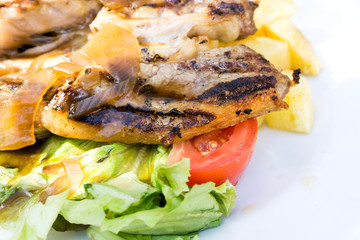 juicy steak beef meat with tomato and potatoes