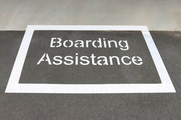 white 'boarding assistance' zone on a train station platform