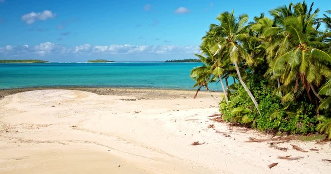 Aerial view of beautiful tropical island lagoon and white sand beach in the South Pacific