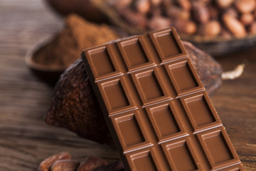 Cocoa pod and chocolate bar and food dessert background