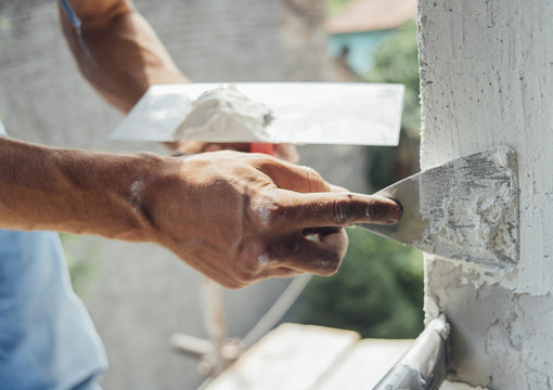Painter working on a scaffold