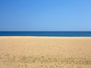 Fototapeta na wymiar Empty sea and sand beach background on Costa Brava, Spain