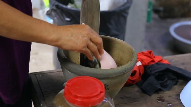 Thai people cooking Green Papaya Salad Recipe or Som Tum