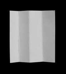 old ripped cardboard on black background