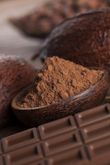 Cocoa pod and chocolate bar and food dessert background