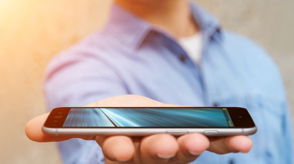 Businessman holding modern mobile phone