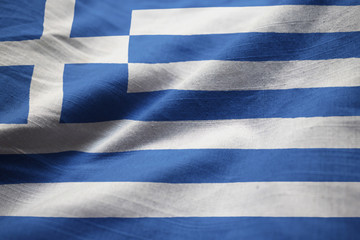 Obraz premium Closeup of Ruffled Greece Flag, Greece Flag Blowing in Wind