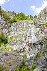 Fototapeta na wymiar enormous waterfall in the mountains of the Pyrenees, Spain