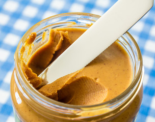 smooth peanut butter on a knife
