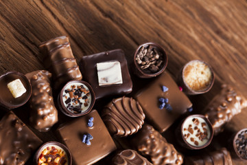Praline Chocolate on wooden backgroud
