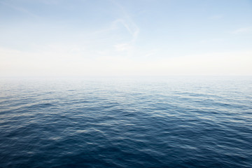 Blue sea and blue sky background.