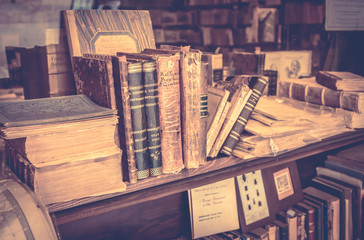 Antique books in antiquarian bookshop
