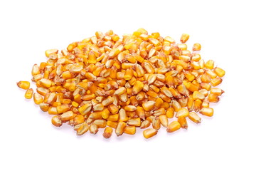 Pile corn grains isolated on white background