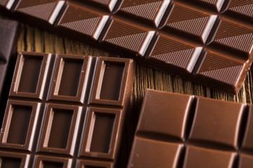 Bars Chocolate , candy sweet, dessert food on wooden background