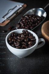 Coffee bean on black stone background