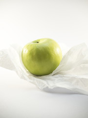 Apple on tissure paper